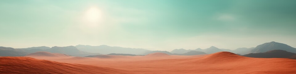 Obraz premium A vast, barren desert landscape with mountains in the background. The sun is shining brightly in the sky, casting a warm glow over the scene. The emptiness of the desert