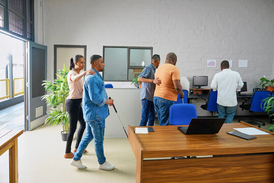 Group of business people entering office