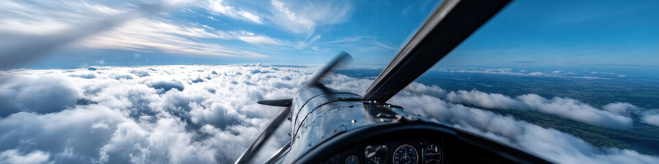 Aerial View of Cumulus Clouds from Light Aircraft Cockpit
