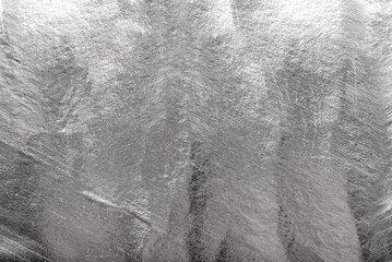 Stainless steel texture with shine. Silver steel background. Metal