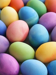 Obraz premium Multicolored Easter eggs in pastel shades, arranged closely together. A festive and colorful concept on a soft textured background