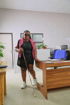 Visually impaired woman in office