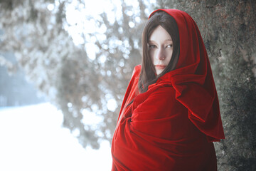 female in red cloak