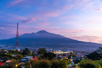 Fototapeta premium View towards Batu city , Malang, Indonesia from the top of the hill