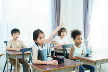 Group of diverse children enjoy learning about the STEM.