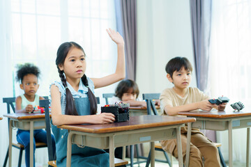 Group of diverse children enjoy learning about the STEM.