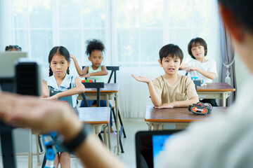 Group of diverse children enjoy learning about the STEM.