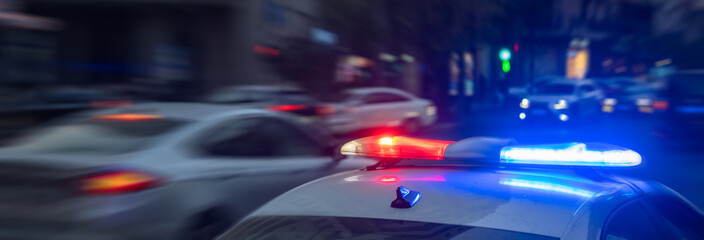 police cars in motion, blurred