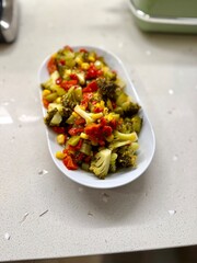 Healthy Homemade Broccoli Salad with olive oil, garlic and vegetables
