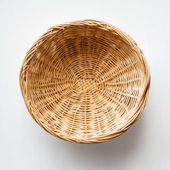Fototapeta premium Wicker round basket on a white background