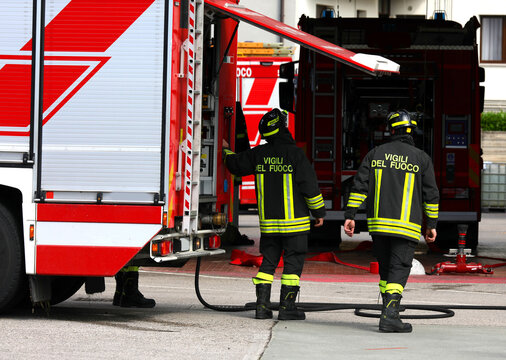 Vicenza, VI, Italy - May 23, 2024: italian firefighters with their fire trucks