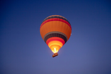 Amazing aerial view of a beautiful hot air balloon over Cappadocia at dawn