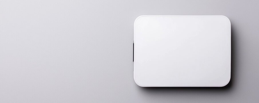 A portable card reader for business transactions with a minimal design on a solid white background, single object
