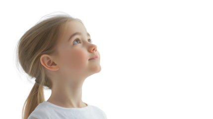 Portrait of a young girl looking up with a thoughtful expression, filled with innocence, curiosity, and hope, bathed in soft natural light, capturing the beauty of childhood dreams