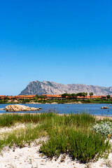 Salina Bamba beach with Molara island on the background in Sardinia, Italy