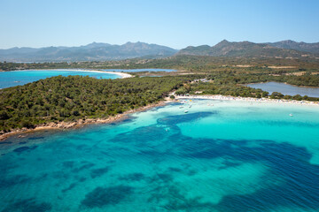 Drone aerial view of Brandinchi beach with white sand and turquoise water in Sardinia, Italy