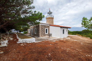 The famous Skinari Lighthouse on the island of Zakynthos is a popular tourist destination