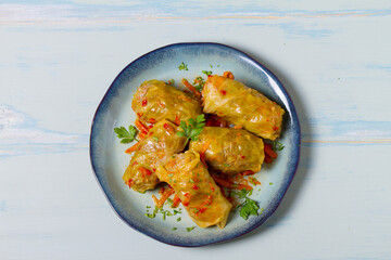 Stuffed cabbage leaves. Cabbage wraps or rolls. Chou farci, dolma, sarma, golubtsy or golabki on...