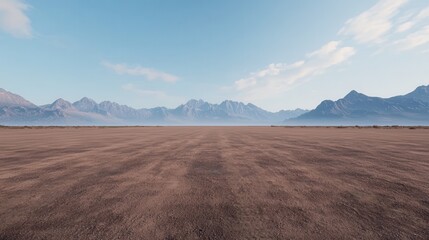 Obraz premium Vast Rugged Terrain with Subtle Dust Under Clear Blue Sky