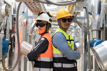 Group of male plumber engineer working and inspecting quality of water pipes system at building...