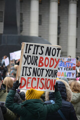Person holding a sign at the 2025 People's March in New York City.