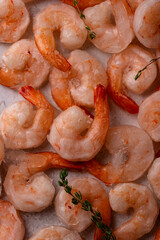 Frozen uncooked prawns or shrimps with lemon