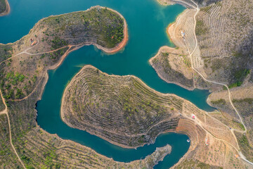 Amazing abstract landscape of Sabor lake, Tras os Montes  Portugal. Drone vision, aerial view of Serpente do Medal, Sabor River, tourist attraction and travel destination in Northern Portugal.