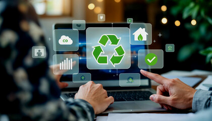 Fototapeta premium Person Interacting with Sustainability Software on Laptop