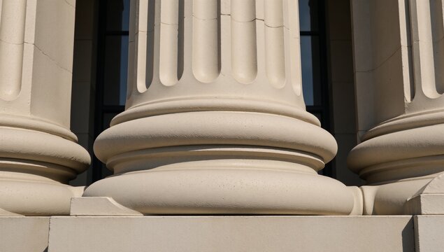 A classical bank column with intricate carvings and an air of elegance