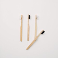 Three bamboo toothbrushes displayed against a clean white backdrop with ample room for product details and branding