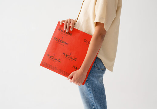 Mockup Of Woman Holding Customizable Record Sleeve