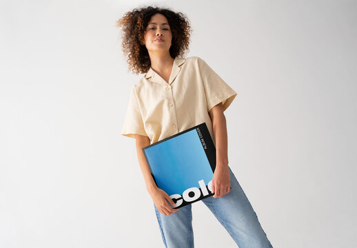 Mockup Of Woman Holding Customizable Album Sleeve