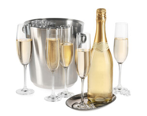 Champagne and bucket with ice isolated on white
