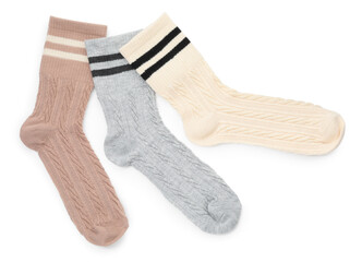 Different soft socks isolated on white, top view