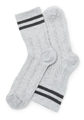 Pair of soft socks isolated on white, top view