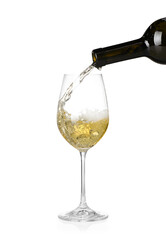 Pouring wine into glass on white background