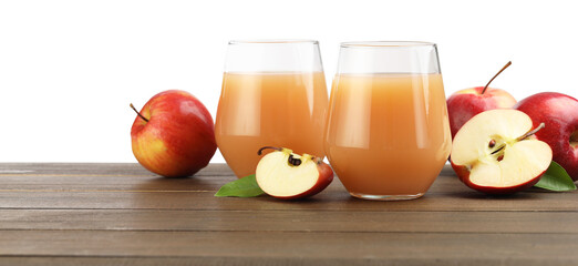 Tasty apple juice and fresh fruits on wooden table against white background