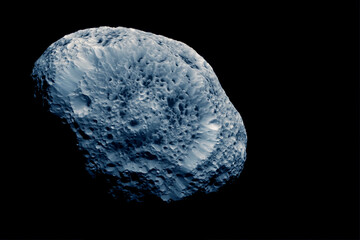 Asteroid in space, on a dark background. Elements of this image furnished by NASA
