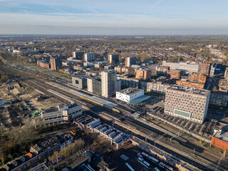 Fototapeta premium Aerial drone photo of the train station and railway tracks in Gouda, the Netherlands.