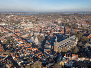 Fototapeta premium Aerial drone photo of the old town hall and the market square in the city center of Gouda, the Netherlands.
