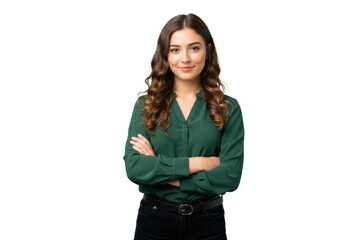 A confident young woman with wavy brown hair in a green blouse and black pants, standing with arms crossed isolated on transparent background