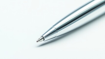 Close-up of a sleek silver pen showcasing its elegant design and smooth tip against a clean background for promotional or corporate purposes.