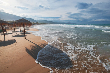 Beach with big waves at the Ionian Sea on the island of Zakynthos in the sunshine