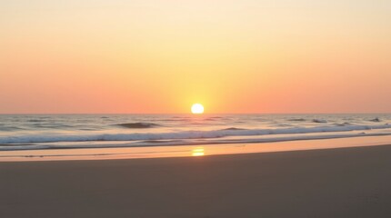 Obraz premium Serene Sunset: Ocean Beachscape in Warm Hues