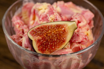 creamy sweet ice cream and sliced red fig fruits