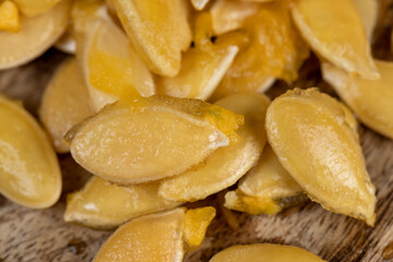 wet fresh seeds of ripe orange pumpkin
