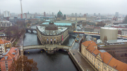 Ukrainian flags over the Bode-Museum in Berlin and Spree river  and Fernsehturm © Marat Lala