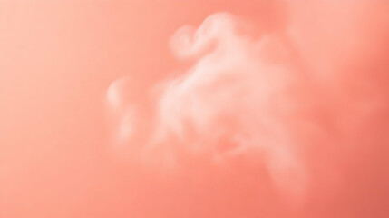 Mist particles scattered delicately into the air against a solid pastel coral background, softly lit for natural clarity