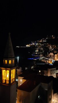 Aerial view of St Johns Church, old town Budva, and the Adriatic coast.
