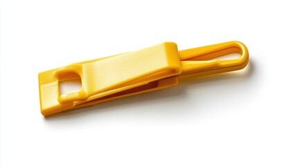 Yellow plastic zipper pull, isolated, studio shot, white background, clothing accessory